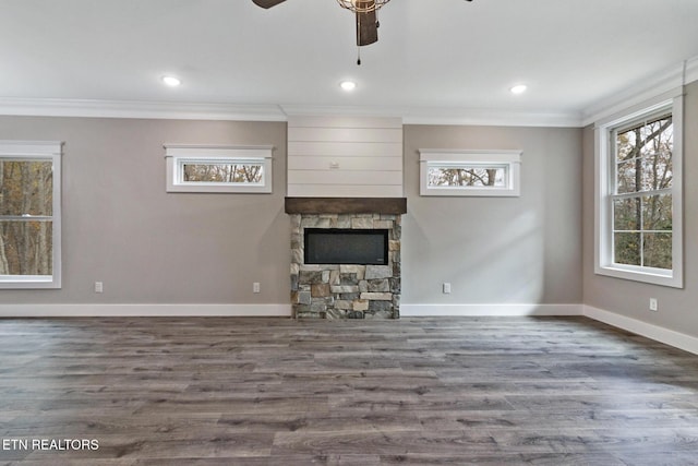 13 Norwich Ter, Fairfield Glade, TN 38558 - unfurnished living room featuring a fireplace, ceiling fan, ornamental molding, wood finished floors, and recessed lighting