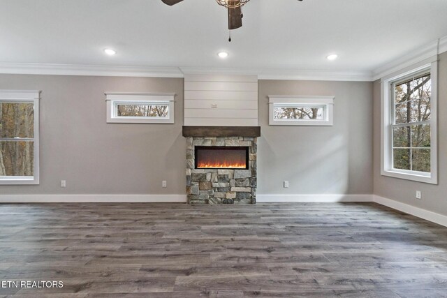 13 Norwich Ter, Fairfield Glade, TN 38558 - unfurnished living room with ceiling fan, crown molding, a fireplace, wood finished floors, and recessed lighting
