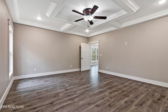 empty room with dark wood-type flooring, coffered ceiling, ceiling fan, and crown molding