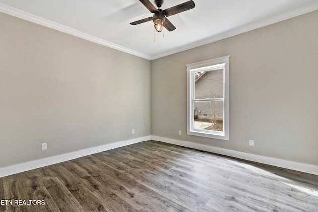 unfurnished room featuring hardwood / wood-style floors, ceiling fan, and crown molding