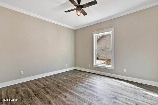13 Norwich Ter, Fairfield Glade, TN 38558 - unfurnished room with ornamental molding, a ceiling fan, and dark wood finished floors