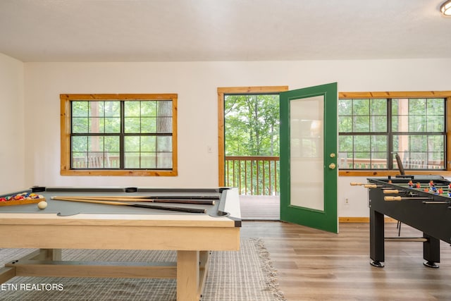 rec room featuring hardwood / wood-style flooring and billiards