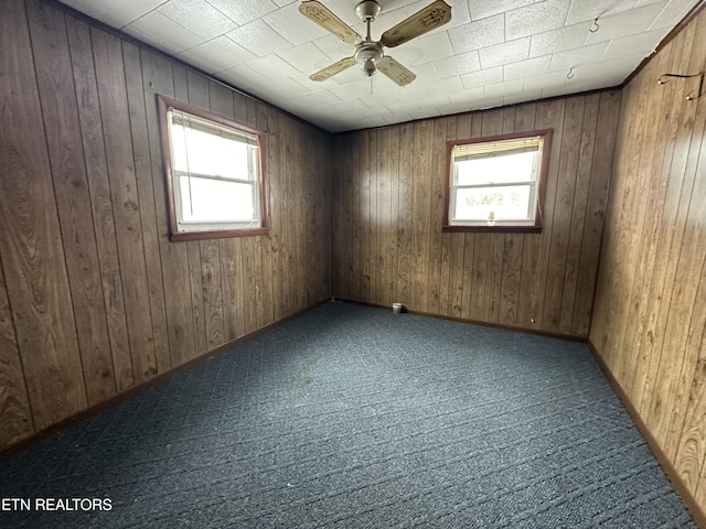 empty room with carpet and ceiling fan