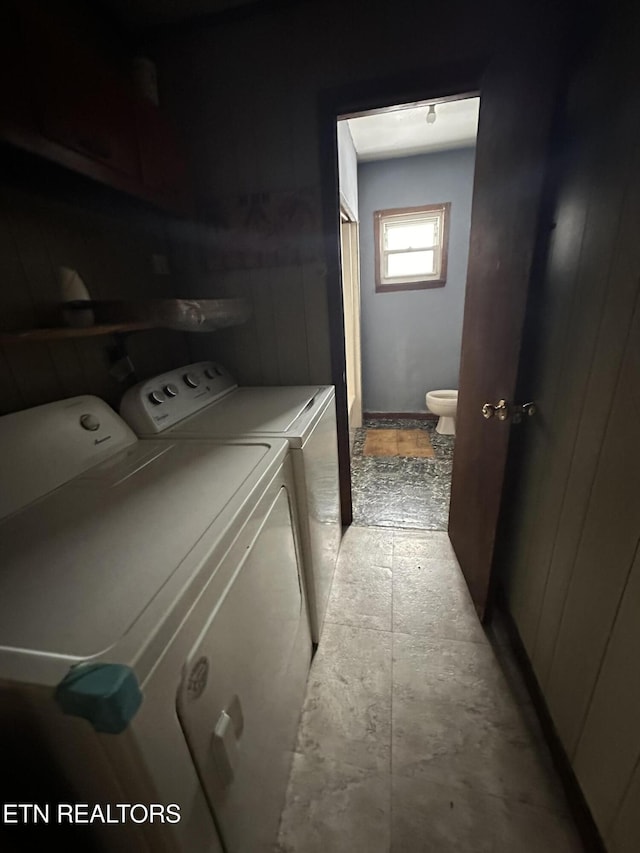 laundry room with washing machine and dryer and laundry area