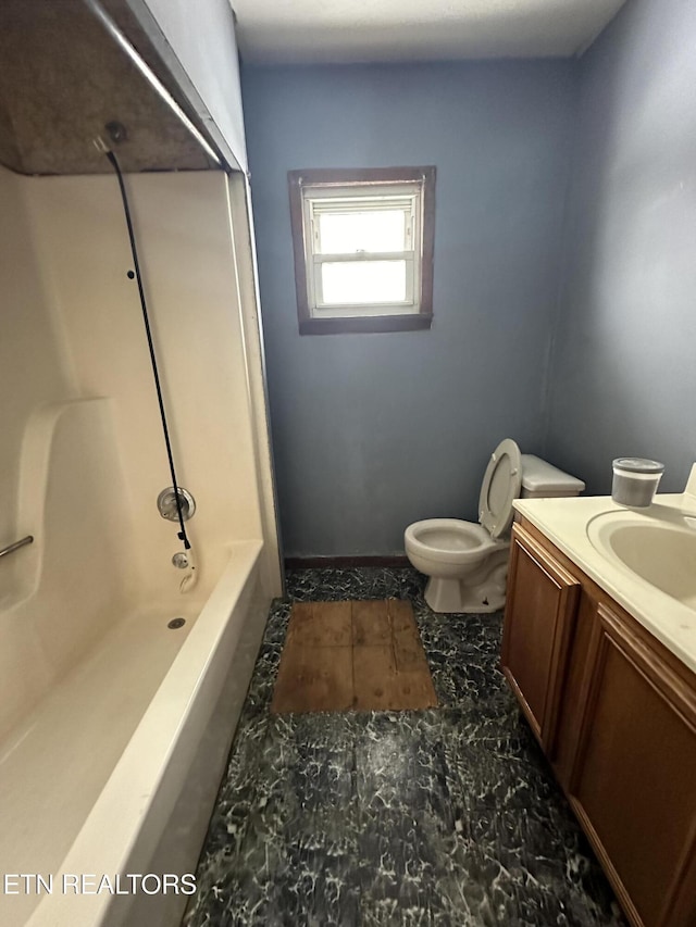 bathroom with shower / bath combination, vanity, and toilet