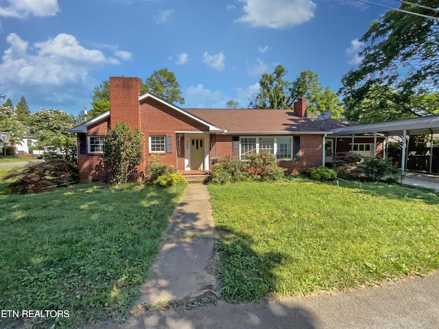 ranch-style house with a carport and a front yard