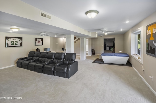 interior space featuring stairway, a ceiling fan, visible vents, and baseboards