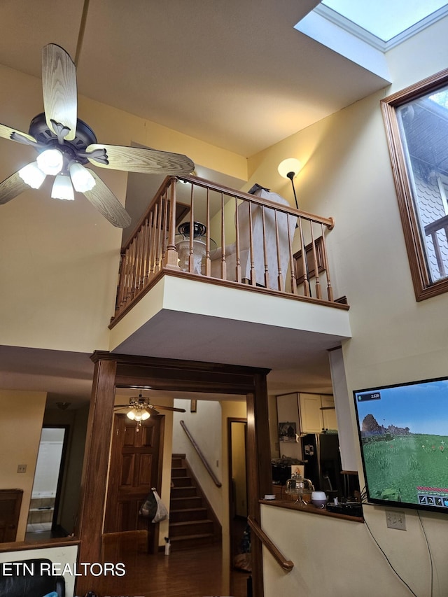 stairs with ceiling fan