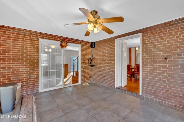 view of patio with ceiling fan