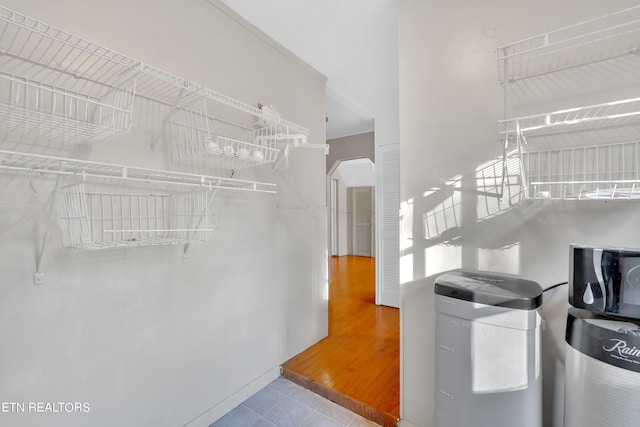 walk in closet featuring light wood-type flooring