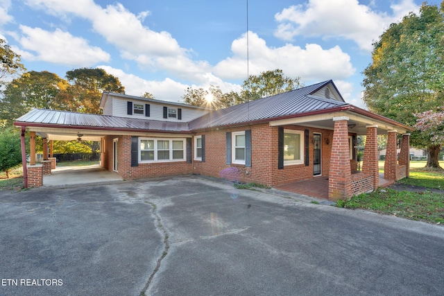 view of front of house with a carport