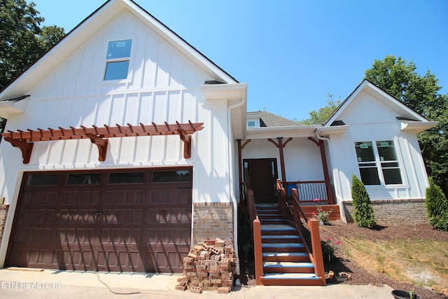 modern farmhouse style home featuring a porch