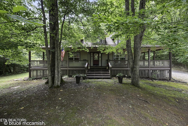 view of front of house with a deck