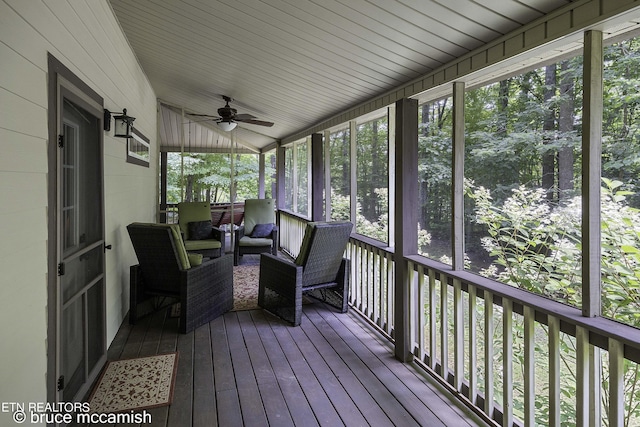 sunroom / solarium with ceiling fan