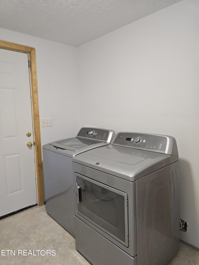 washroom featuring independent washer and dryer