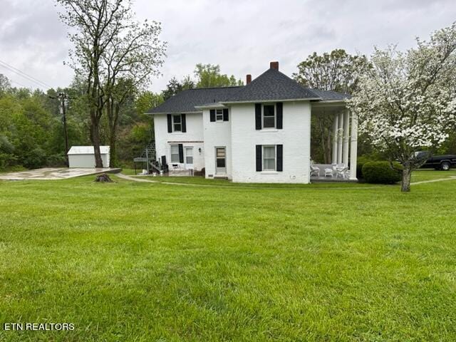 696 Forge Ridge Rd, Harrogate, TN 37752 - rear view of property with a yard and a chimney