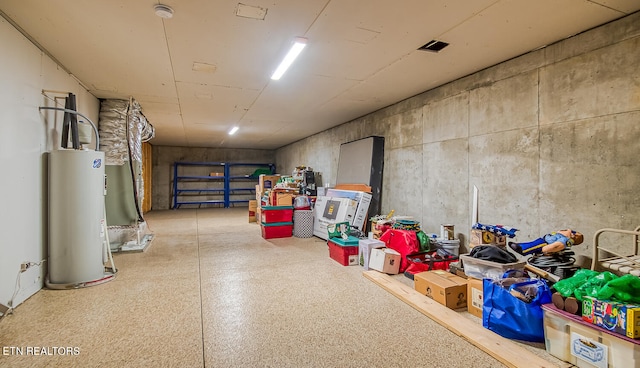 basement featuring water heater