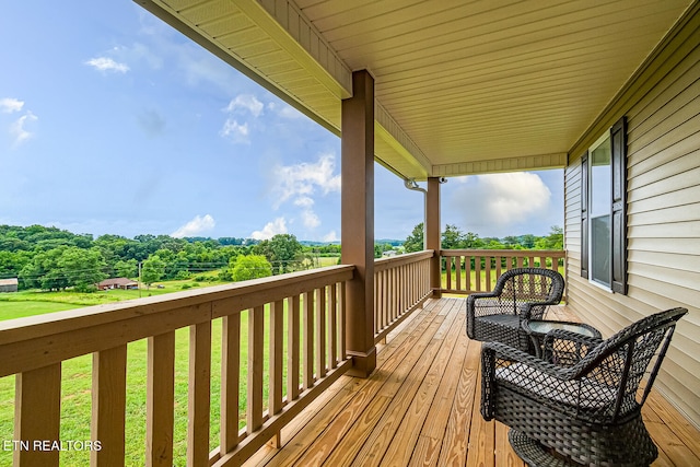 deck featuring a yard