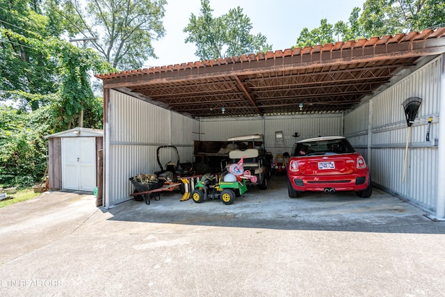 garage featuring a carport