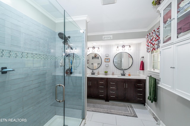 bathroom featuring tile patterned flooring, vanity, an enclosed shower, and ornamental molding