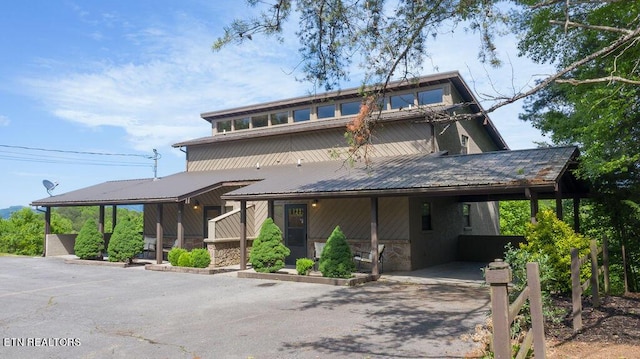 view of front of house featuring a carport