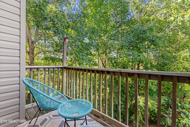 wooden balcony with a wooden deck