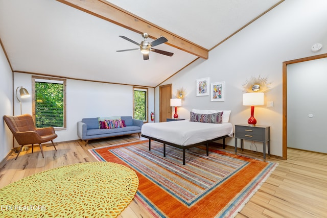 bedroom with vaulted ceiling with beams, ceiling fan, and wood-type flooring