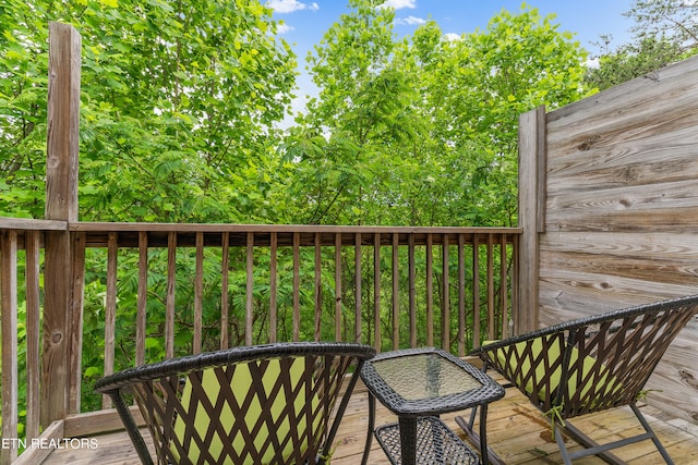 wooden balcony with a wooden deck