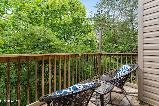 wooden balcony with a wooden deck