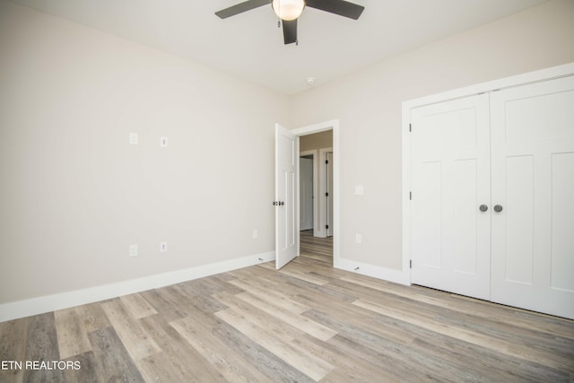 116 Duseth Dr, Sweetwater, TN 37874 - unfurnished bedroom with light wood-style floors, a ceiling fan, and a closet