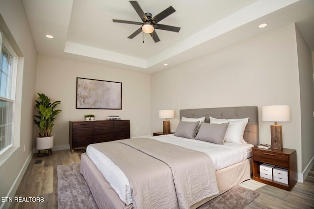 116 Duseth Dr, Sweetwater, TN 37874 - bedroom with wood finished floors, a raised ceiling, multiple windows, recessed lighting, and a ceiling fan
