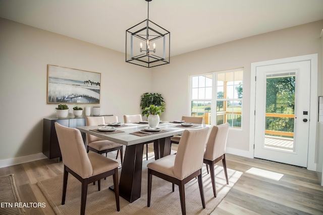 116 Duseth Dr, Sweetwater, TN 37874 - dining room with light wood-style floors and a chandelier