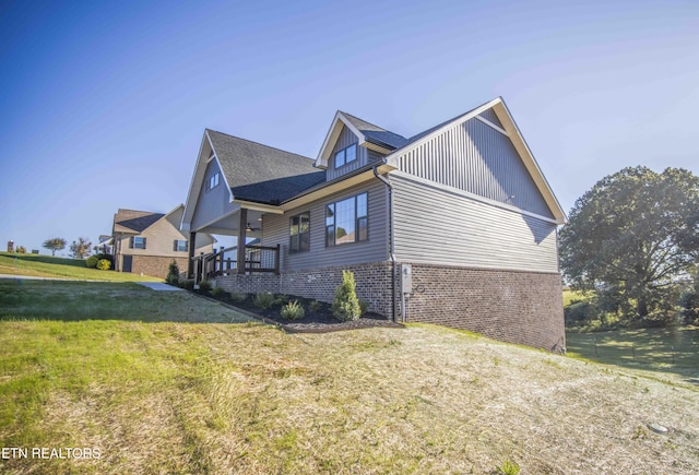 116 Duseth Dr, Sweetwater, TN 37874 - view of side of home with brick siding and a lawn