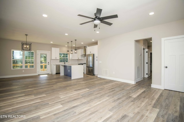 116 Duseth Dr, Sweetwater, TN 37874 - unfurnished living room with ceiling fan, recessed lighting, and light wood-type flooring