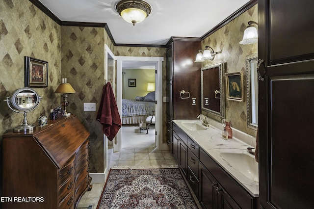 full bathroom with a sink, ornamental molding, ensuite bathroom, and wallpapered walls