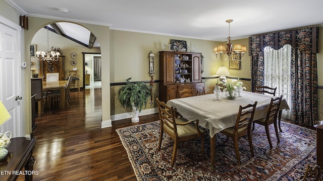 dining area with an inviting chandelier, arched walkways, dark wood-style flooring, and ornamental molding