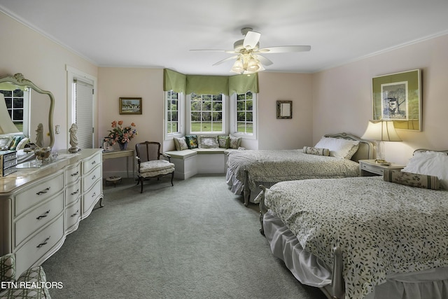 bedroom with carpet flooring, ceiling fan, and ornamental molding