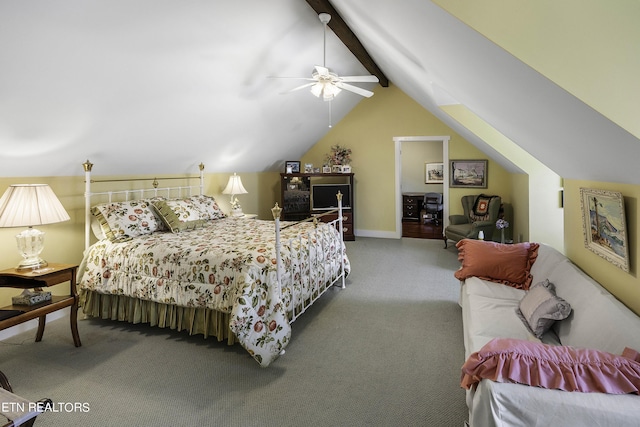 bedroom featuring lofted ceiling with beams, carpet floors, and a ceiling fan