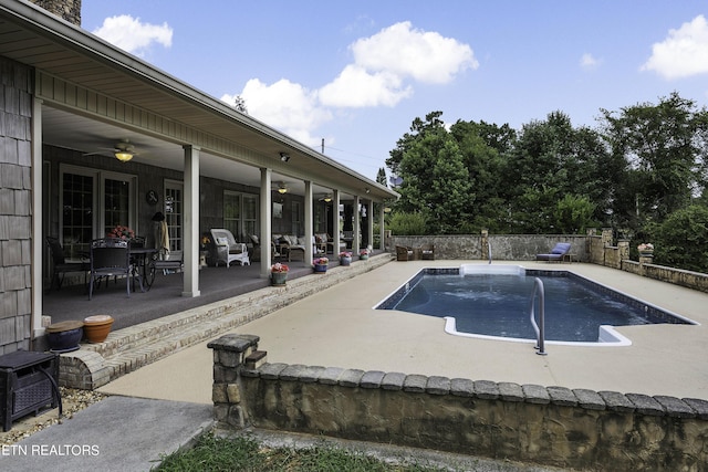 view of pool featuring a ceiling fan, a patio area, a fenced in pool, and a fenced backyard