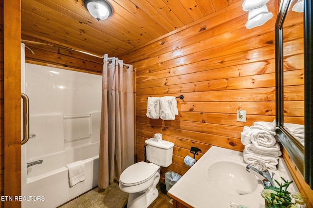 full bathroom with wood ceiling, vanity, wooden walls, toilet, and shower / bath combo with shower curtain