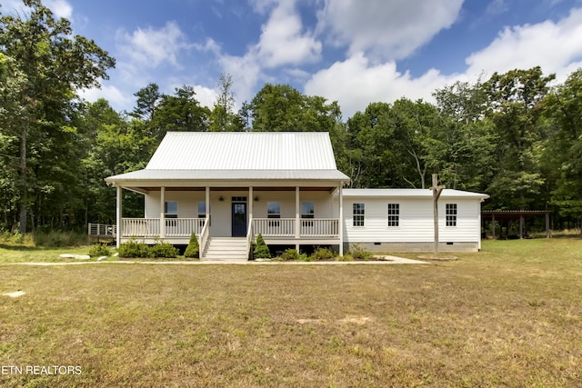 view of front facade featuring covered porch and a front yard