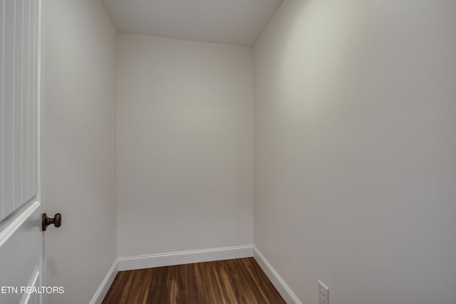 empty room with hardwood / wood-style floors