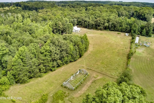 birds eye view of property featuring a rural view