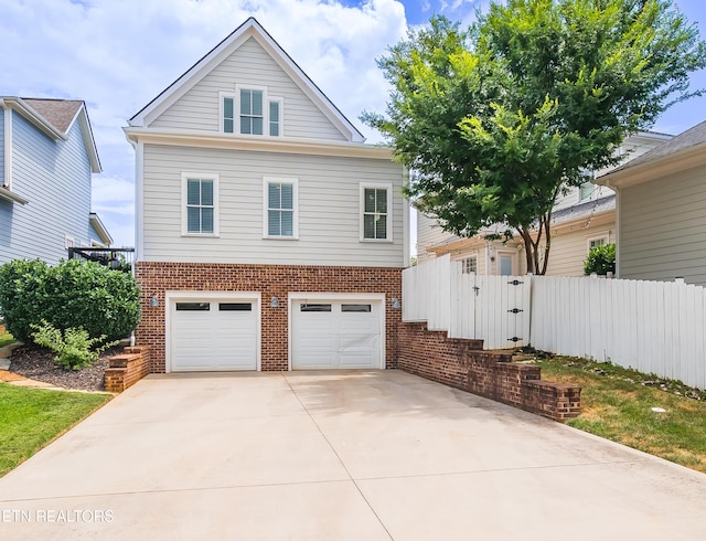 view of front of property with a garage