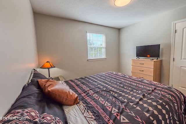 bedroom with a textured ceiling