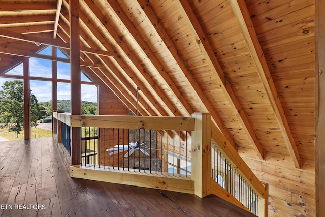 bonus room with vaulted ceiling with beams, dark wood-type flooring, and wood ceiling