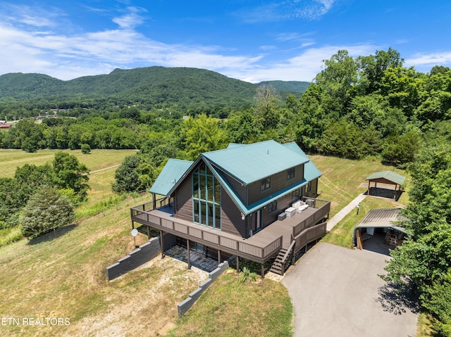 birds eye view of property featuring a mountain view