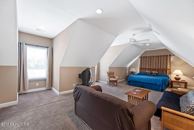 bedroom featuring ceiling fan, light carpet, and lofted ceiling