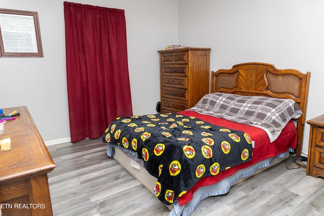 bedroom featuring light hardwood / wood-style floors