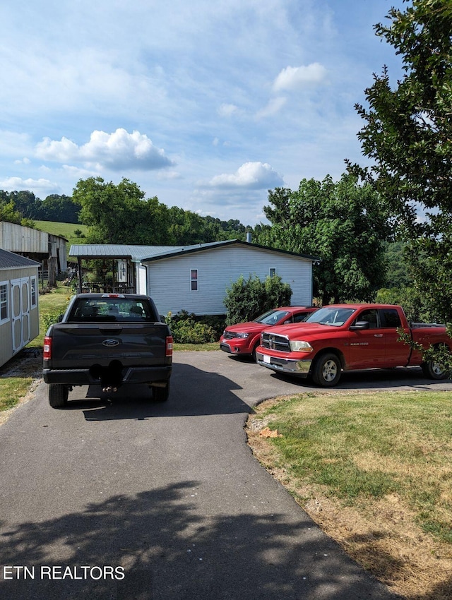 exterior space with a front lawn